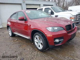 2012 BMW X6 35i with VIN 5UXFG2C54CL779333, listed as a IAAI auction lot 41914135 with 63,305 mi miles. Bid and sale history available at carsss.com. Image 1.