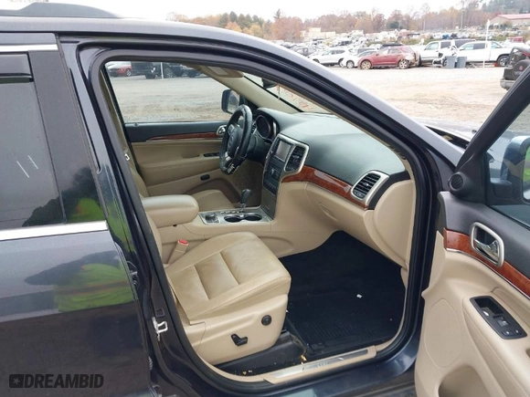 2013 Jeep Grand Cherokee Limited with VIN 1C4RJFBG1DC618482, listed as a IAAI auction lot 40707340 with 108,102 mi miles. Bid and sale history available at carsss.com. Image 5.