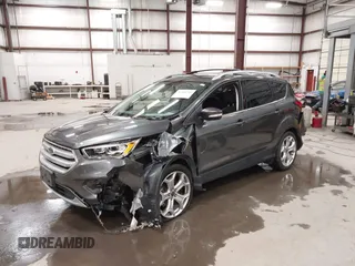 2019 Ford Escape Titanium with VIN 1FMCU9J91KUB11957, listed as a IAAI auction lot 41928264 with 72,460 mi miles. Bid and sale history available at carsss.com. Image 2.