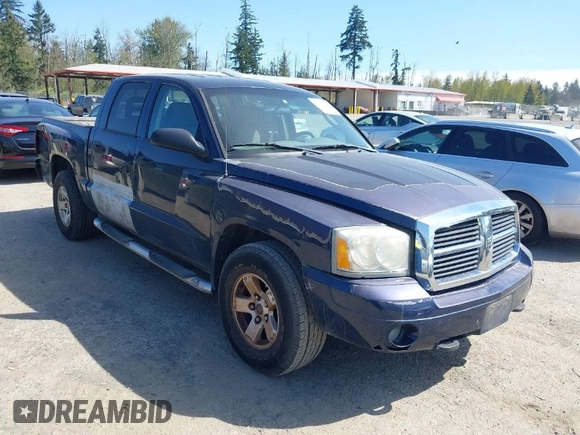 2006 Dodge Dakota SLT z VIN 1D7HW48NX6S708140, wystawiony jako IAAI lot #42054527 z przebiegiem 226 944 mil mil oraz . Historia ofert i sprzedaży dostępna na DreamBid. Obrazek 1.