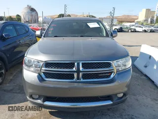 2012 Dodge Durango SXT with VIN 1C4RDJAG2CC271772, listed as a IAAI auction lot 42760810 with 151,215 mi miles and . Bid and sale history available at DreamBid. Image 12.
