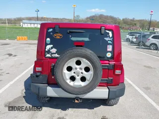 2013 Jeep Wrangler Unlimited Sahara с VIN 1C4BJWEG5DL569977, выставлен на аукционе IAAI как лот 41980394 с пробегом 145 571 миль миль и . История ставок и продаж доступна на DreamBid. Изображение 16.