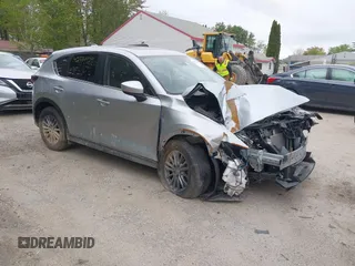 2021 Mazda CX-5 Touring z VIN JM3KFBCM3M1314881, wystawiony jako IAAI lot #42334929 z przebiegiem Nie podano mil oraz . Historia ofert i sprzedaży dostępna na DreamBid. Obrazek 1.