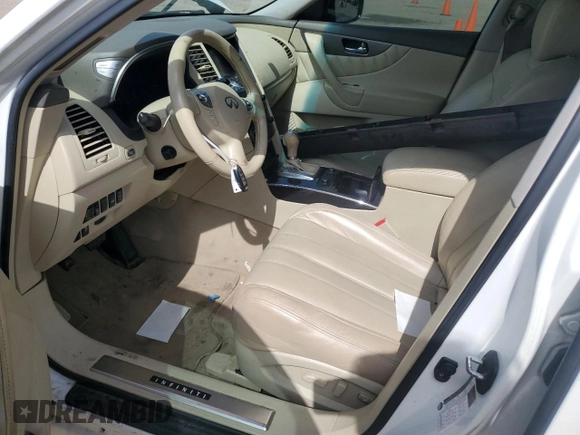 2014 Infiniti QX70 with VIN JN8CS1MU3EM451423, listed as a Copart auction lot 63205685 with 134,192 mi miles and Salvage title. Bid and sale history available at DreamBid. Image 7.
