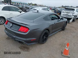 2020 Ford Mustang EcoBoost with VIN 1FA6P8TD1L5184204, listed as a IAAI auction lot 42421848 with 94,492 mi miles and . Bid and sale history available at DreamBid. Image 4.