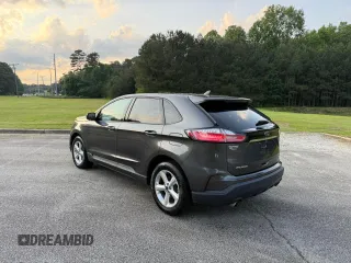 2020 Ford Edge SE с VIN 2FMPK3G9XLBB11099, выставлен на аукционе Copart как лот 66417805 с пробегом 119 223 миль миль и Чистый • Clean title. История ставок и продаж доступна на DreamBid. Изображение 3.