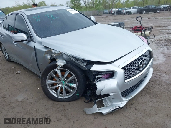 2015 Infiniti Q50 Premium z VIN JN1BV7AR8FM390785, wystawiony jako IAAI lot #42200437 z przebiegiem 94 841 mil mil oraz . Historia ofert i sprzedaży dostępna na DreamBid. Obrazek 6.