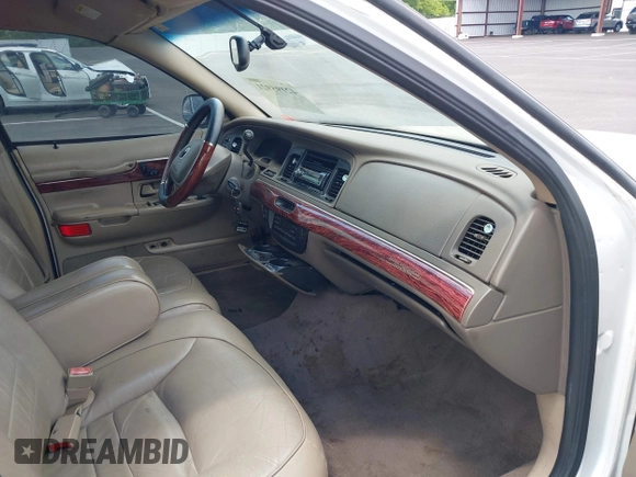 2001 Mercury Grand Marquis LS with VIN 2MEFM75W71X614856, listed as a IAAI auction lot 42195921 with 113,352 mi miles and . Bid and sale history available at DreamBid. Image 5.