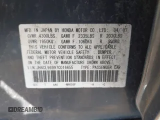 2007 Acura TSX Navi with VIN JH4CL96997C016655, listed as a IAAI auction lot 41812900 with 163,915 mi miles. Bid and sale history available at carsss.com. Image 9.