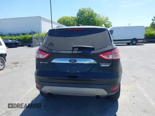 2015 Ford Escape Titanium с VIN 1FMCU0JX5FUB87813, выставлен на аукционе IAAI как лот 42035295 с пробегом 148 430 миль миль и . История ставок и продаж доступна на DreamBid. Изображение 16.