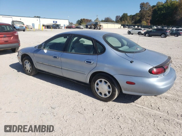 1998 Ford Taurus LX z VIN 1FAFP52U5WA273382, wystawiony jako Copart lot #77102854 z przebiegiem 73 014 mil mil oraz Szkoda całkowita • Salvage title. Historia ofert i sprzedaży dostępna na DreamBid. Obrazek 2.