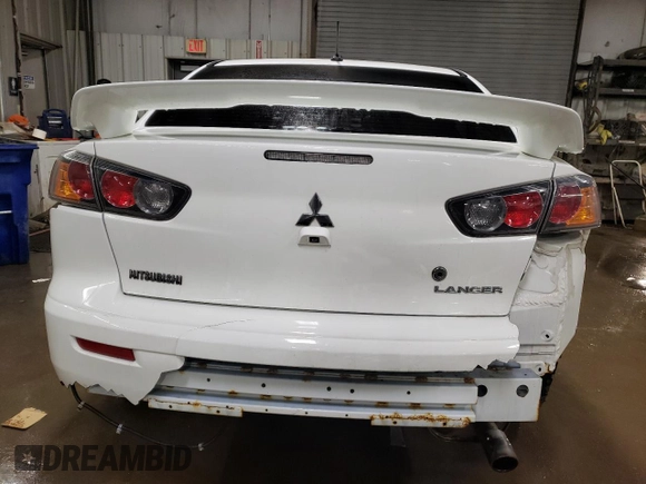 2014 Mitsubishi Lancer GT with VIN JA32U8FWXEU023131, listed as a Copart auction lot 44616945 with 84,977 mi miles and Salvage Title. Bid and sale history available at carsss.com. Image 6.