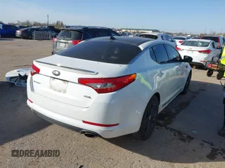 2013 Kia Optima SX z VIN 5XXGR4A64DG161664, wystawiony jako IAAI lot #41352483 z przebiegiem 81 664 mil mil oraz . Historia ofert i sprzedaży dostępna na DreamBid. Obrazek 4.