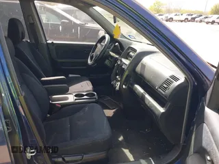 2005 Honda CR-V LX with VIN JHLRD68565C010765, listed as a IAAI auction lot 41843854 with 248,201 mi miles and . Bid and sale history available at carsss.com. Image 5.
