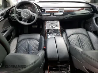 2015 Audi A8 4.0T with VIN WAUJ2AFD5FN013267, listed as a Copart auction lot 39065654 with 64,541 mi miles and . Bid and sale history available at DreamBid. Image 8.