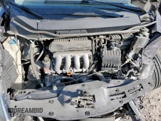 2009 Honda Fit Sport z VIN JHMGE88479S009638, wystawiony jako Copart lot #59407455 z przebiegiem Nie podano mil oraz Szkoda całkowita • Salvage title. Historia ofert i sprzedaży dostępna na DreamBid. Obrazek 11.