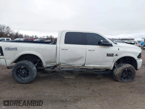 2017 Ram 2500 Laramie z VIN 3C6UR5FL7HG749723, wystawiony jako IAAI lot #41523969 z przebiegiem 133 622 mil mil oraz . Historia ofert i sprzedaży dostępna na DreamBid. Obrazek 13.
