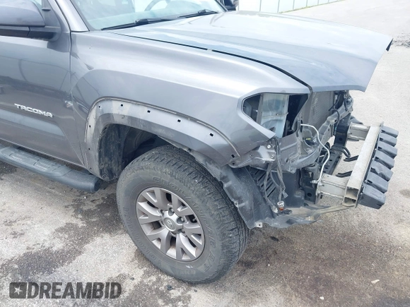 2017 Toyota Tacoma SR with VIN 5TFSX5EN9HX052395, listed as a IAAI auction lot 42290149 with 140,655 mi miles and . Bid and sale history available at DreamBid. Image 18.