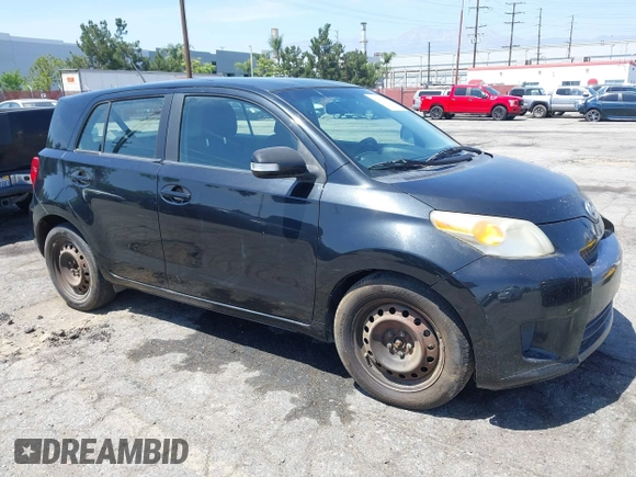 2008 Scion xD with VIN JTKKU10438J014799, listed as a IAAI auction lot 42107563 with 215,136 mi miles. Bid and sale history available at carsss.com. Image 1.