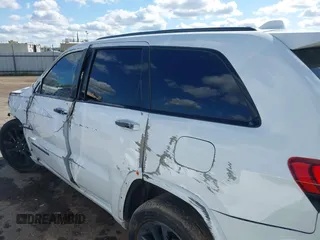 2018 Jeep Grand Cherokee Laredo E with VIN 1C4RJEAG4JC193539, listed as a IAAI auction lot 41827154 with 79,784 mi miles. Bid and sale history available at carsss.com. Image 14.