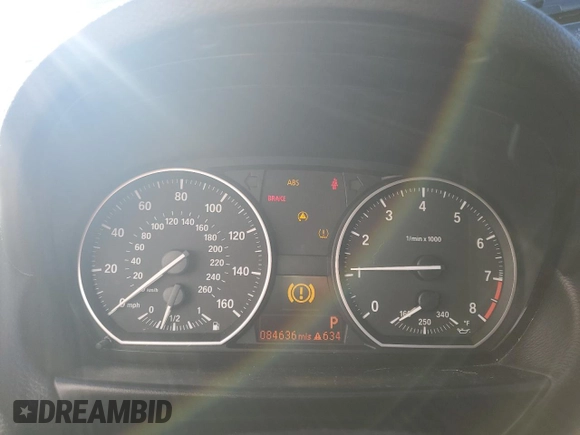 2010 BMW 1 Series 135i with VIN WBAUN9C52AVK41235, listed as a Copart auction lot 85384434 with 84,636 mi miles and Salvage title. Bid and sale history available at DreamBid. Image 9.