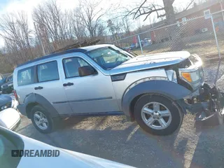 2007 Dodge Nitro SXT with VIN 1D8GU28K67W740794, listed as a IAAI auction lot 41591855 with 162,709 mi miles. Bid and sale history available at carsss.com. Image 14.
