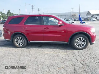 2015 Dodge Durango Limited with VIN 1C4RDHDG9FC100932, listed as a IAAI auction lot 42339913 with 134,865 mi miles and . Bid and sale history available at DreamBid. Image 13.