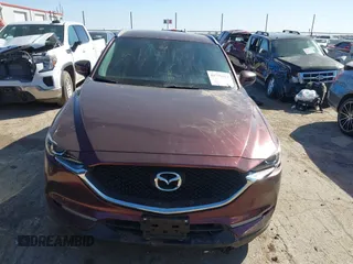 2019 Mazda CX-5 Sport with VIN JM3KFABM2K0686372, listed as a IAAI auction lot 41770183 with 57,202 mi miles and . Bid and sale history available at DreamBid. Image 12.