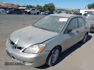 2006 Mitsubishi Lancer ES with VIN JA3AJ26E16U005417, listed as a IAAI auction lot 39811143 with 184,925 mi miles. Bid and sale history available at carsss.com. Image 2.