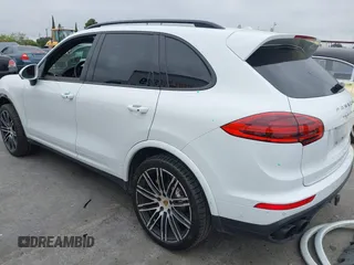 2016 Porsche Cayenne Turbo z VIN WP1AC2A20GLA85193, wystawiony jako IAAI lot #42170440 z przebiegiem 95 999 mil mil oraz . Historia ofert i sprzedaży dostępna na DreamBid. Obrazek 3.