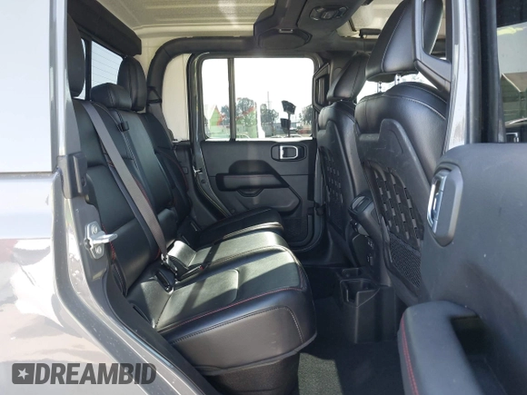 2020 Jeep Gladiator Rubicon with VIN 1C6JJTBG6LL149469, listed as a IAAI auction lot 42224826 with 58,870 mi miles and . Bid and sale history available at DreamBid. Image 8.