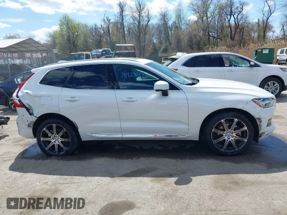 2019 Volvo XC60 Inscription z VIN LYV102RL9KB284828, wystawiony jako IAAI lot #41925864 z przebiegiem 94 394 mil mil oraz . Historia ofert i sprzedaży dostępna na DreamBid. Obrazek 13.