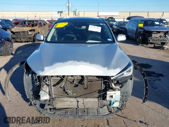 2020 Infiniti QX50 Luxe z VIN 3PCAJ5M37LF105904, wystawiony jako IAAI lot #41251242 z przebiegiem 66 806 mil mil oraz . Historia ofert i sprzedaży dostępna na DreamBid. Obrazek 12.