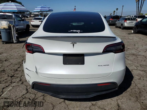 2021 Tesla Model Y Long Range with VIN 5YJYGDEEXMF146617, listed as a Copart auction lot 49347125 with 98,084 mi miles and Salvage Title. Bid and sale history available at DreamBid. Image 6.