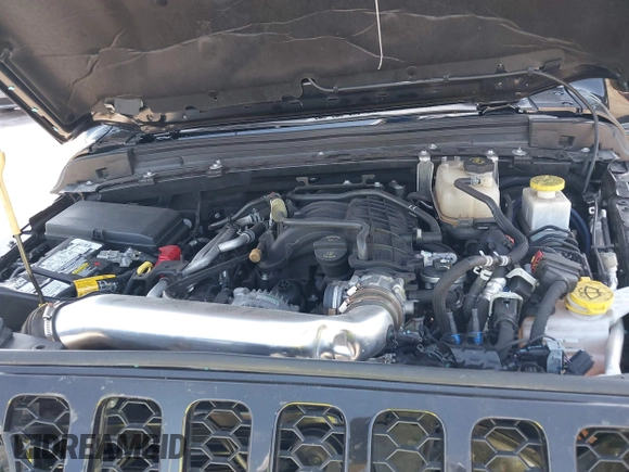 2021 Jeep Gladiator Willys with VIN 1C6HJTAGXML613431, listed as a IAAI auction lot 42180502 with 64,572 mi miles and . Bid and sale history available at DreamBid. Image 9.