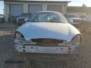 2000 Ford Taurus SE with VIN 1FAFP53U7YG259840, listed as a Copart auction lot 42412595 with 125,226 mi miles and Salvage Title. Bid and sale history available at DreamBid. Image 5.