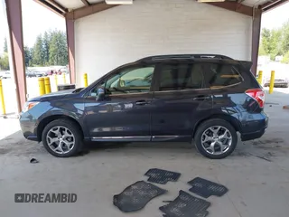 2016 Subaru Forester Touring with VIN JF2SJAXC0GH564305, listed as a IAAI auction lot 42111356 with 75,529 mi miles and . Bid and sale history available at DreamBid. Image 14.