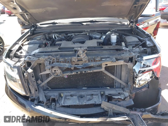 2015 Chevrolet Tahoe LTZ z VIN 1GNSKCKC7FR715512, wystawiony jako IAAI lot #42054583 z przebiegiem 106 941 mil mil oraz . Historia ofert i sprzedaży dostępna na DreamBid. Obrazek 10.