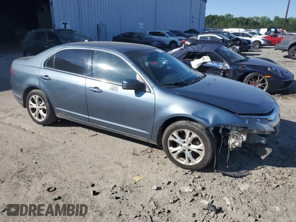 2012 Ford Fusion SE with VIN 3FAHP0HA6CR138972, listed as a Copart auction lot 57448985 with 237,398 mi miles and Salvage title. Bid and sale history available at DreamBid. Image 4.