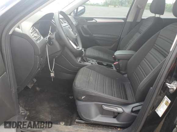 2023 Volkswagen Tiguan S with VIN 3VVFB7AX5PM082907, listed as a Copart auction lot 63643445 with 36,521 mi miles and Salvage title. Bid and sale history available at DreamBid. Image 7.
