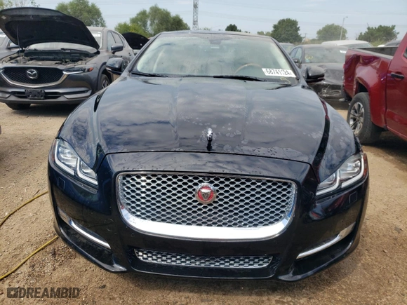 2016 Jaguar XJ with VIN SAJWJ2GD1G8V99354, listed as a Copart auction lot 68741124 with NaN miles and Salvage Title. Bid and sale history available at carsss.com. Image 5.