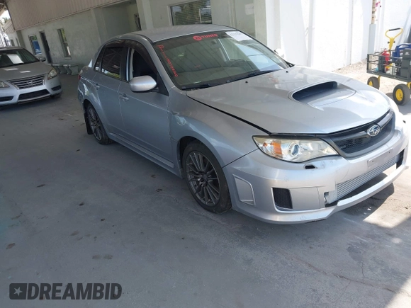 2013 Subaru Impreza Sedan WRX WRX with VIN JF1GV7E60DG014909, listed as a IAAI auction lot 42127645 with 70,360 mi miles. Bid and sale history available at carsss.com. Image 1.