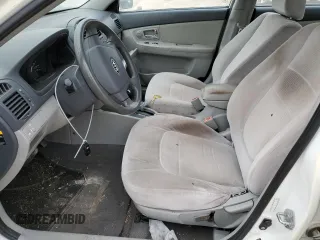 2008 Kia Spectra EX with VIN KNAFE121585499963, listed as a Copart auction lot 77143883 with 153,965 mi miles and Salvage Title. Bid and sale history available at carsss.com. Image 7.