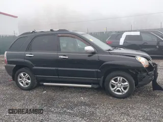 2008 Kia Sportage LX with VIN KNDJE723987527110, listed as a IAAI auction lot 42020008 with 197,810 mi miles and . Bid and sale history available at DreamBid. Image 13.