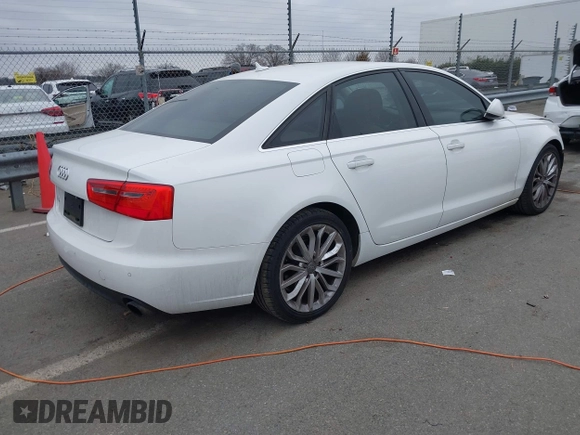 2013 Audi A6 Premium Plus with VIN WAUGFAFC6DN051237, listed as a IAAI auction lot 41553452 with 114,446 mi miles and . Bid and sale history available at DreamBid. Image 4.
