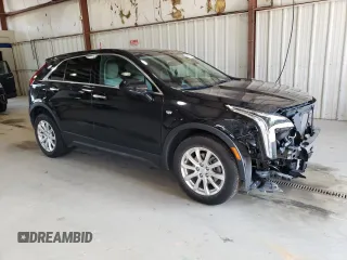 2020 Cadillac XT4 AWD Luxury with VIN 1GYFZBR42LF081550, listed as a Copart auction lot 68891524 with 27,985 mi miles and Salvage Title. Bid and sale history available at carsss.com. Image 4.