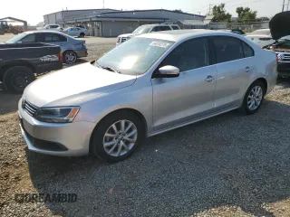 2014 Volkswagen Jetta SE с VIN 3VWD17AJ9EM437088, выставлен на аукционе Copart как лот 64810275 с пробегом 92 165 миль миль и Списание • Salvage title. История ставок и продаж доступна на DreamBid. Изображение 1.