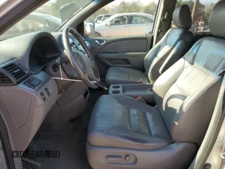 2010 Honda Odyssey EX-L with VIN 5FNRL3H77AB050740, listed as a Copart auction lot 48907735 with 239,818 mi miles and Clean Title. Bid and sale history available at carsss.com. Image 7.