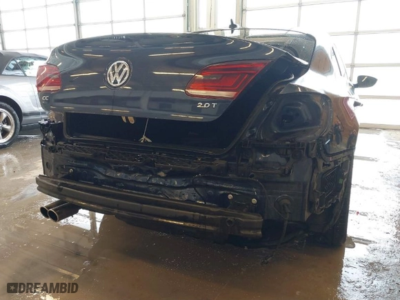 2013 Volkswagen CC Sport with VIN WVWBN7ANXDE515691, listed as a IAAI auction lot 41598295 with 104,461 mi miles. Bid and sale history available at carsss.com. Image 6.