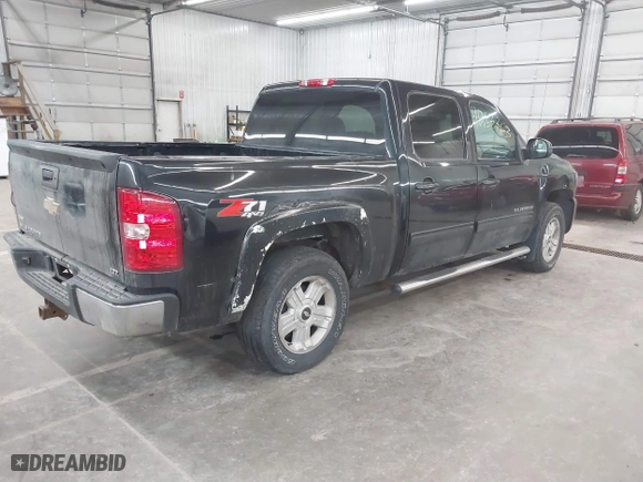 2009 Chevrolet Silverado 1500 LTZ with VIN 3GCEK33399G285667, listed as a IAAI auction lot 41253363 with 219,199 mi miles. Bid and sale history available at carsss.com. Image 4.